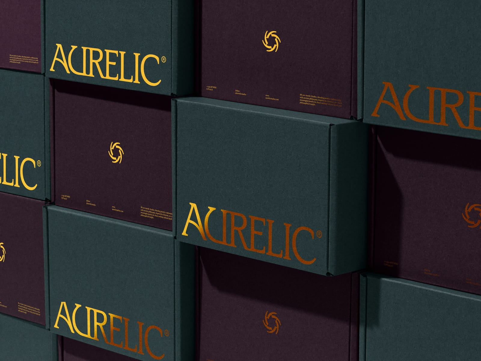 A wall of Aurelic keepsake boxes in plum and forest green